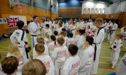 Black Belts Breaking Boards at the White Dobok Day
